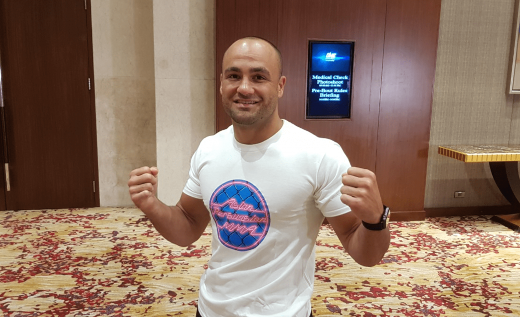 Eddie Alvarez wearing an Asian Persuasion MMA tee shirt