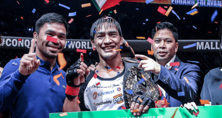 Eduard Folayang celebrating win inside the ONE cage with Manny Pacquiao