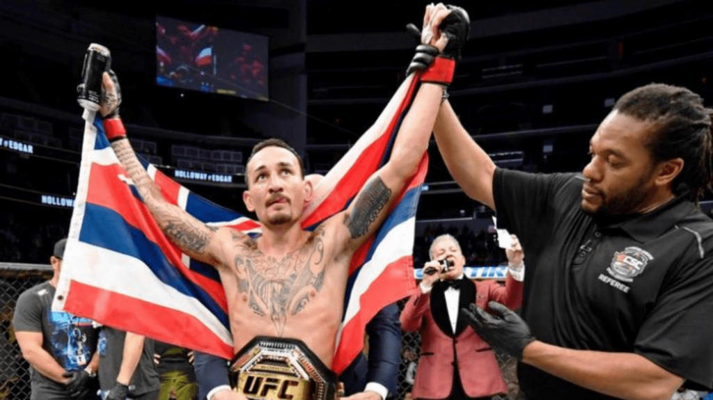 Max Holloway getting his hand raised at UFC 240